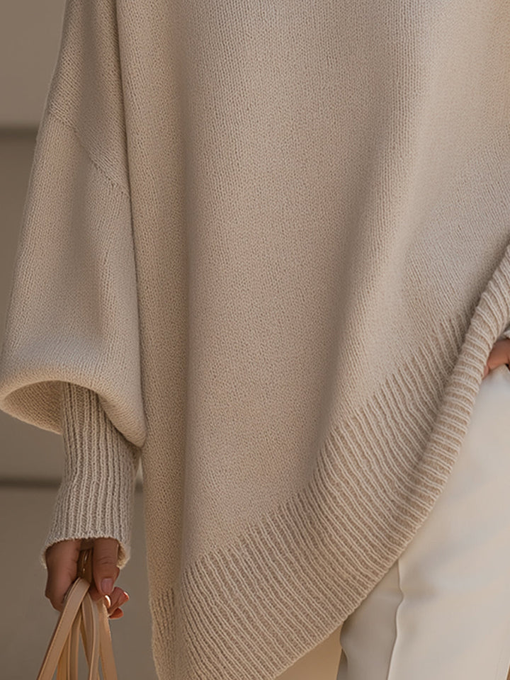 Comfortable Knit Sweater for Women with Crew Neck Batwing Sleeve Asymmetric Hem Oversized Style