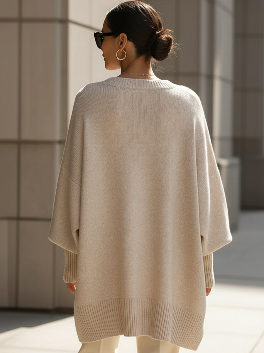 Comfortable Knit Sweater for Women with Crew Neck Batwing Sleeve Asymmetric Hem Oversized Style