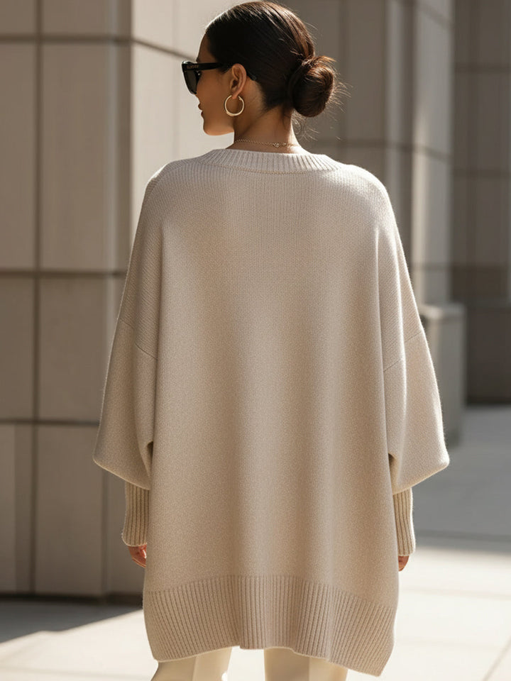 Comfortable Knit Sweater for Women with Crew Neck Batwing Sleeve Asymmetric Hem Oversized Style