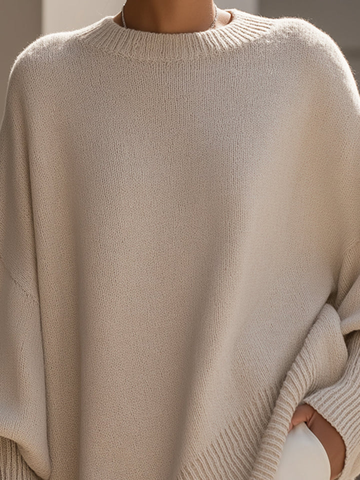 Comfortable Knit Sweater for Women with Crew Neck Batwing Sleeve Asymmetric Hem Oversized Style