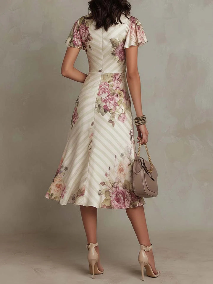 Elegant Ivory Floral Midi Dress for Women with V Neck Flutter Sleeve Ruched Wrap Flowing Wedding Guest Style