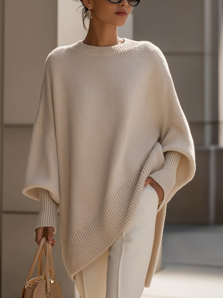 Comfortable Knit Sweater for Women with Crew Neck Batwing Sleeve Asymmetric Hem Oversized Style