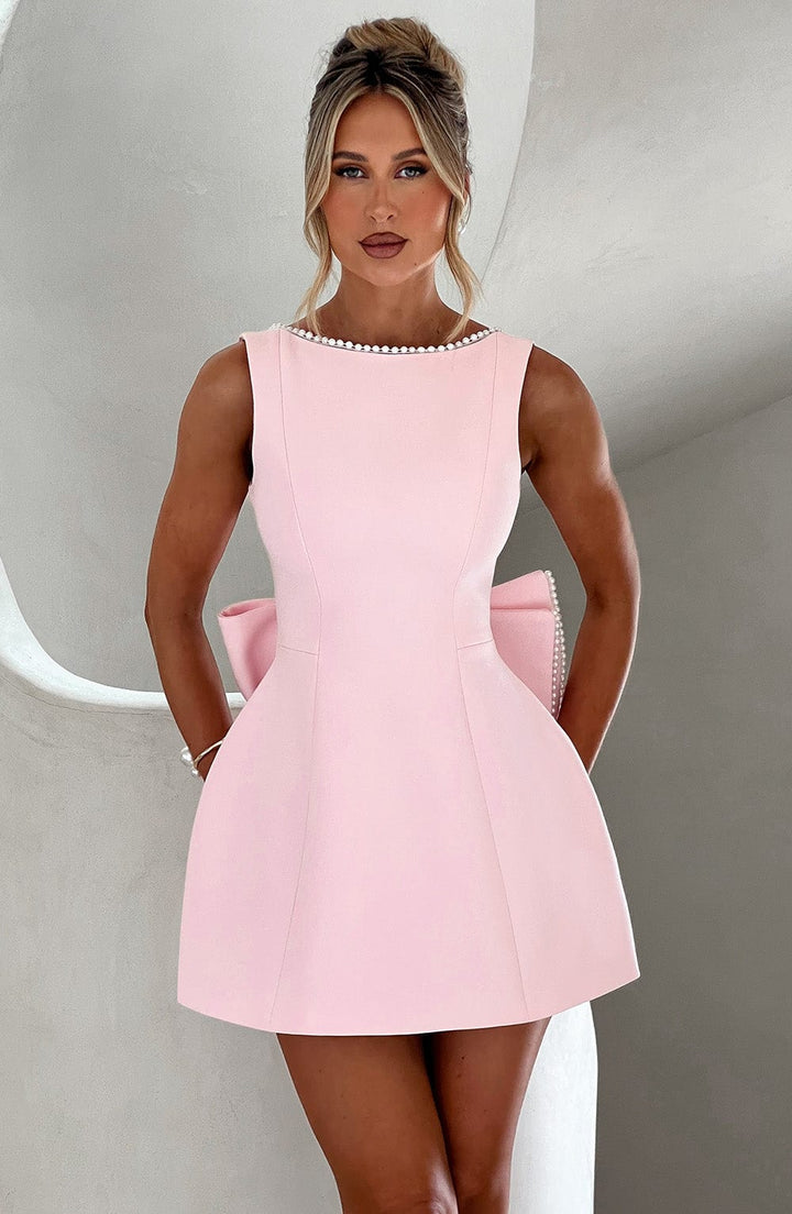 Elegant Pearl Trim Mini Dress for Women with Bateau Neck Sleeveless Bow Back Fit and Flare Cocktail Style