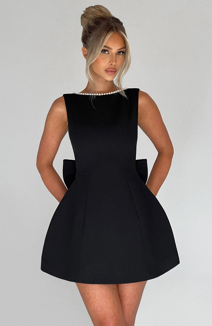 Elegant Pearl Trim Mini Dress for Women with Bateau Neck Sleeveless Bow Back Fit and Flare Cocktail Style