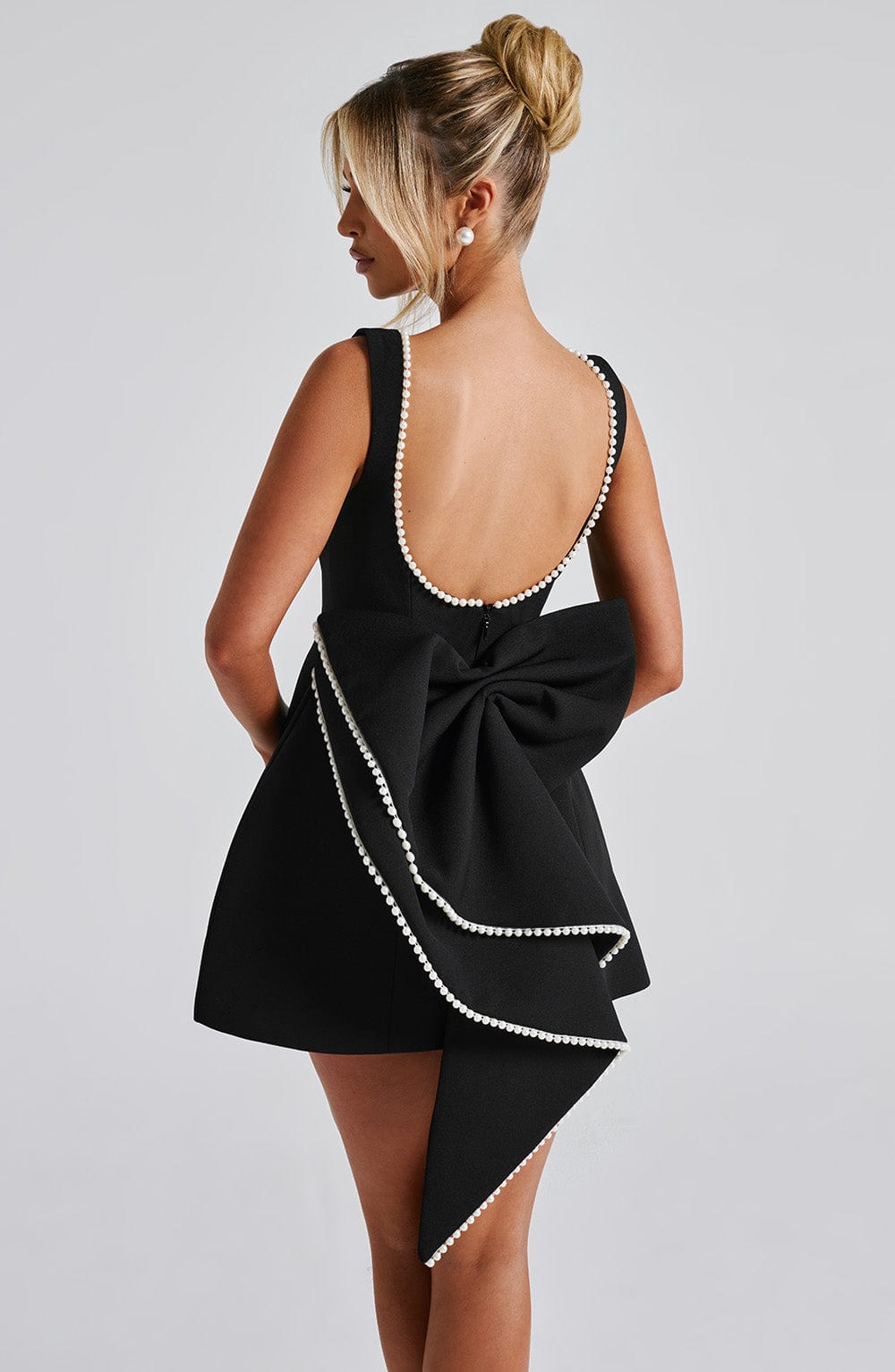 Elegant Pearl Trim Mini Dress for Women with Bateau Neck Sleeveless Bow Back Fit and Flare Cocktail Style