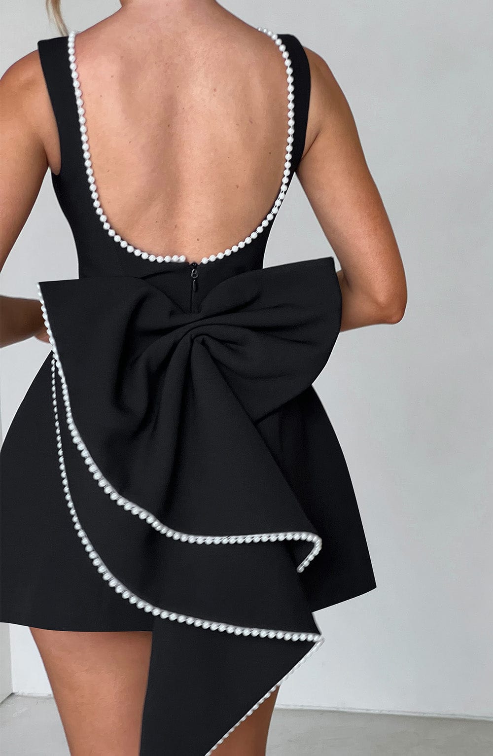 Elegant Pearl Trim Mini Dress for Women with Bateau Neck Sleeveless Bow Back Fit and Flare Cocktail Style