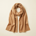 Francesca draped long scarf in warm camel, arranged on a cream studio backdrop